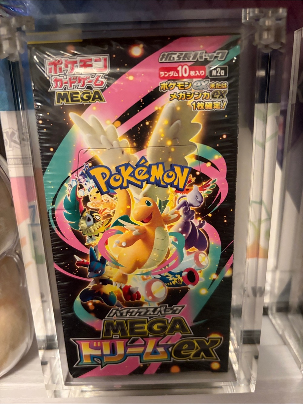 Pokemon Mega Dream ex Booster Pack – Pink, Teal, Yellow, Black